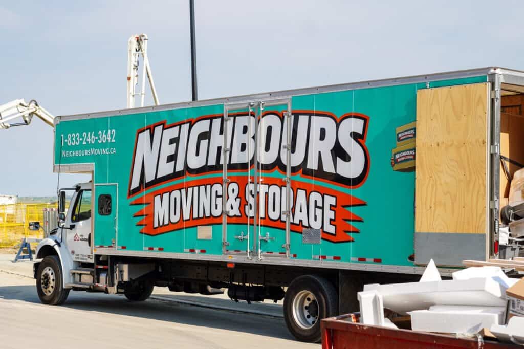 Neighbours Moving & Storage truck arrives on-site, ready to provide reliable residential and commercial moving services with professional care.